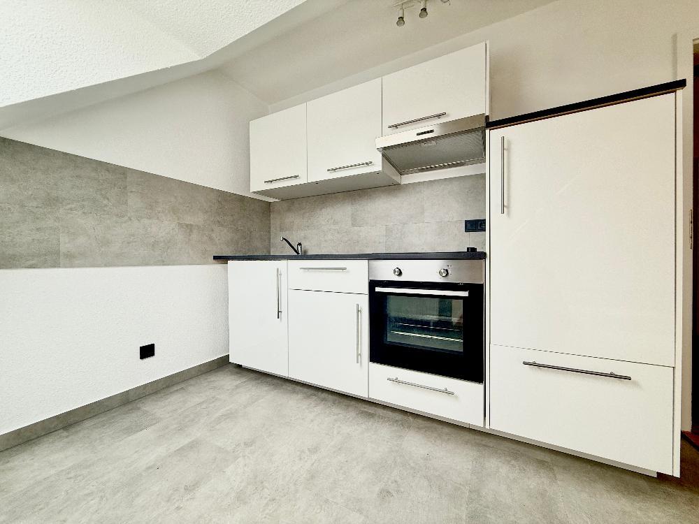 Modernisierte 1-Raum-Dachgeschosswohnung mit Einbauküche in ruhiger Lage von Leipzig-Liebertwolkwitz - Foto 5
