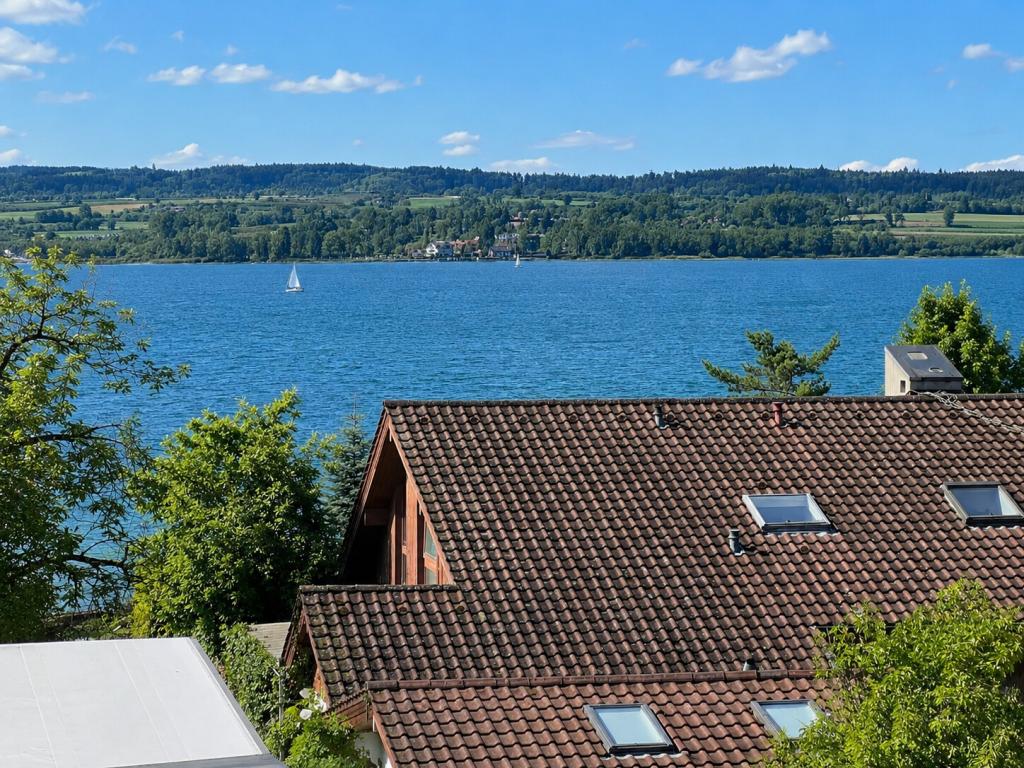 Ein Steinwurf bis zum See. Wohnung mit Seesicht in TOP Lage! - Photo 1