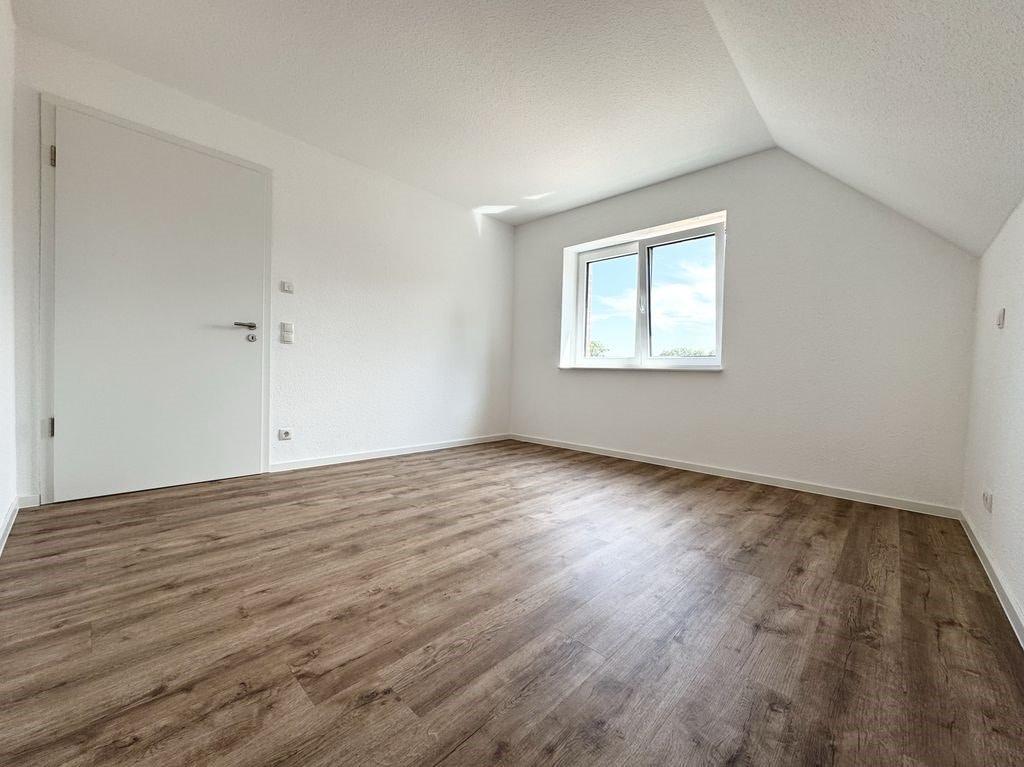 Neubau - Dachgeschosswohnung zur Warmmiete in Uelsen - Foto 4