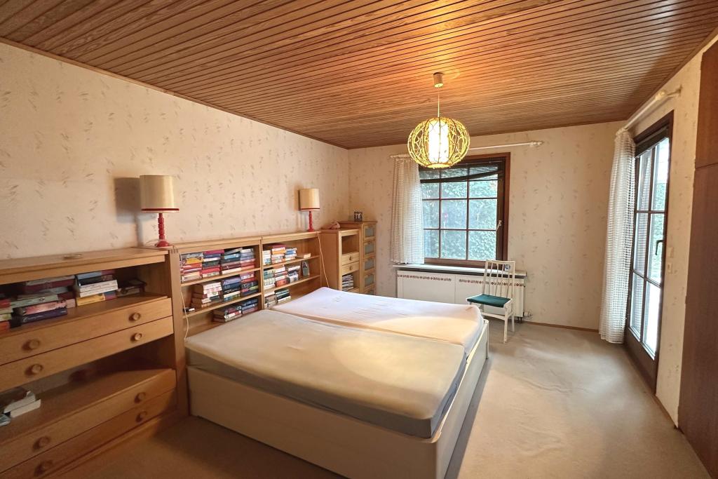 Schlafzimmer EG mit Zugang zum Wintergarten