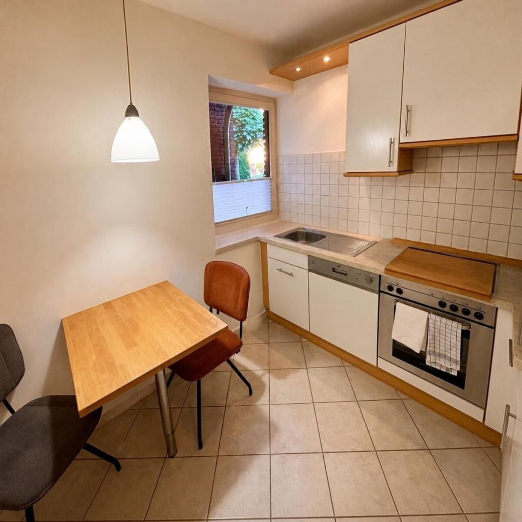 Gemütlich u. ruhig gelegen: 2-Zi-Singlewohnung mit Einbauküche u. Terrasse - Foto 5