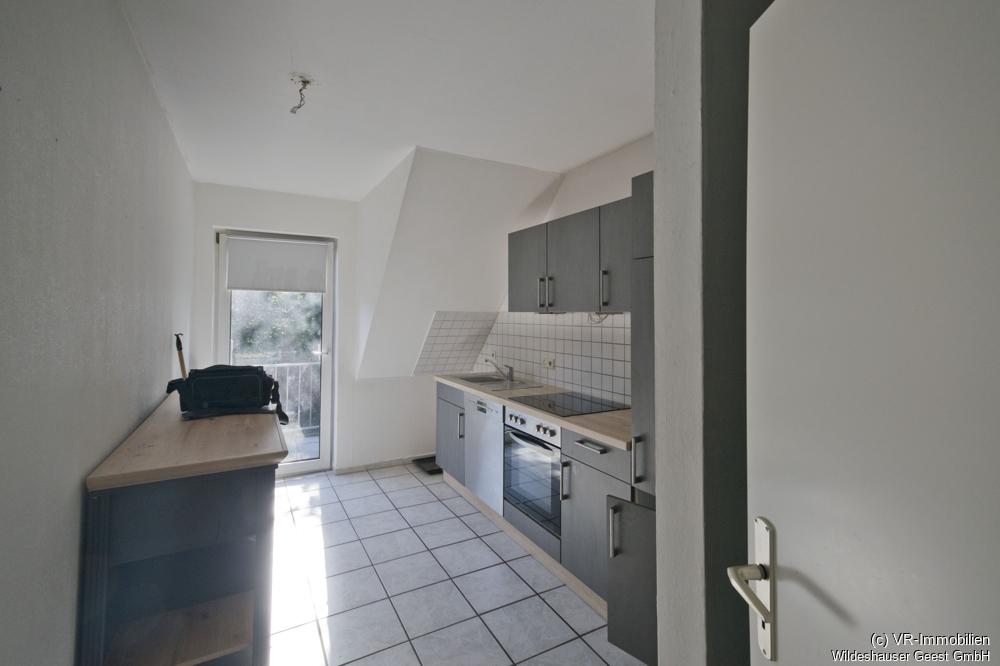 Dachgeschosswohnung im Vierfamilienhaus - Foto 2