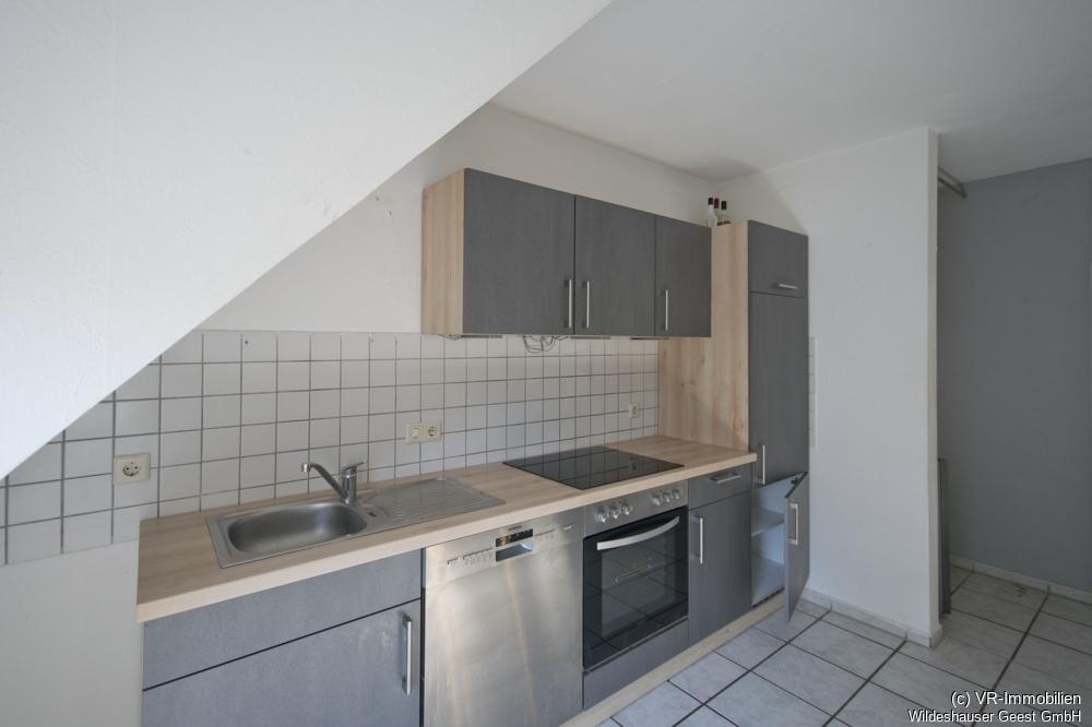 Dachgeschosswohnung im Vierfamilienhaus - Foto 1