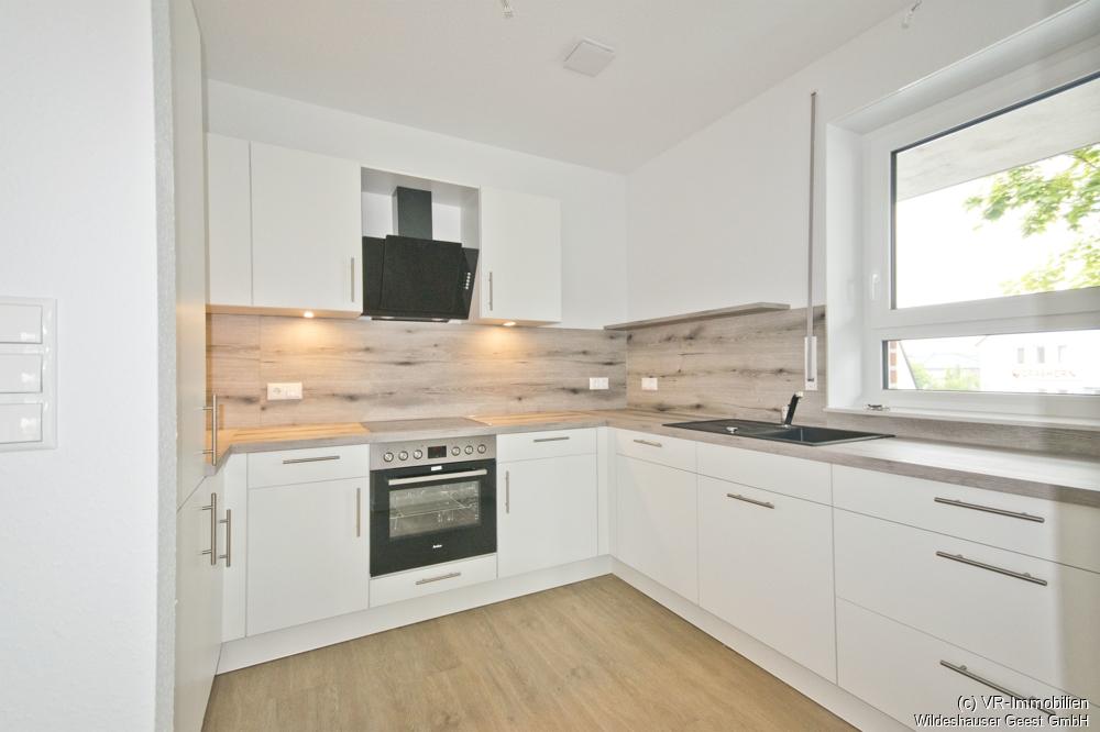 Neubau: Zentral gelegene 4-Zimmer-Obergeschosswohnung mit Einbauküche und Aufzug - Photo 3