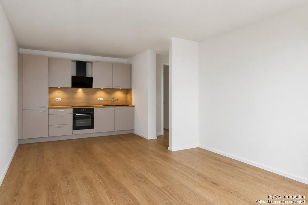 Erstbezug: Energieeffiziente 2-Zimmer-Wohnung in zentraler Lage von Wildeshausen - Photo 2
