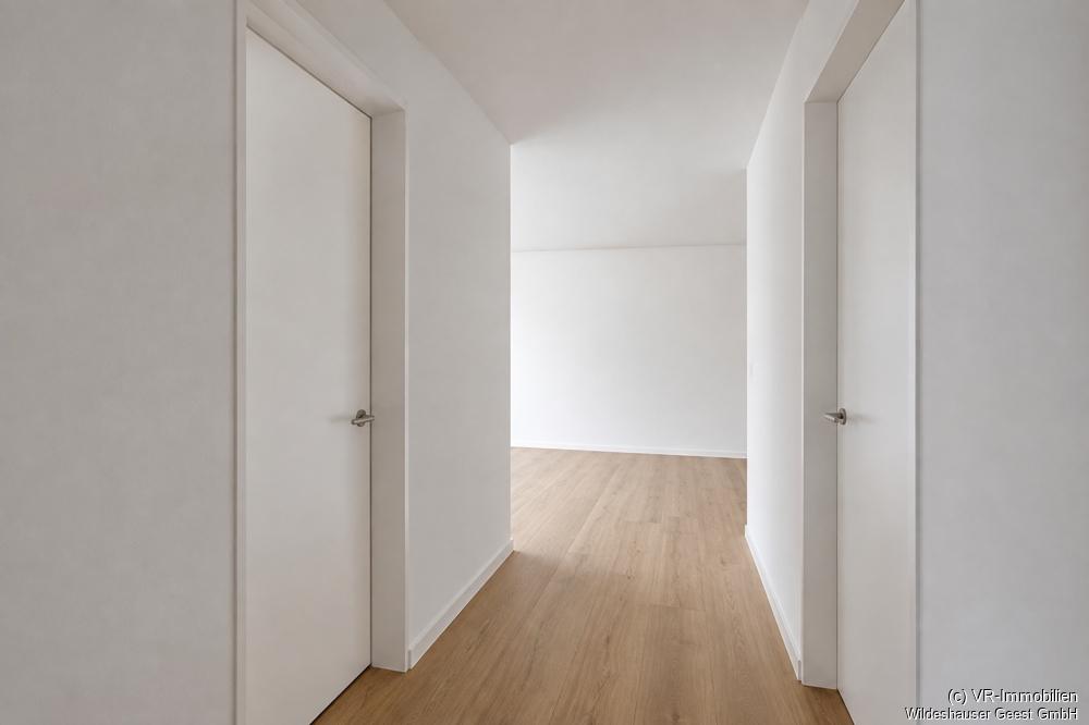 Erstbezug: Energieeffiziente 2-Zimmer-Wohnung in zentraler Lage von Wildeshausen - Photo 4