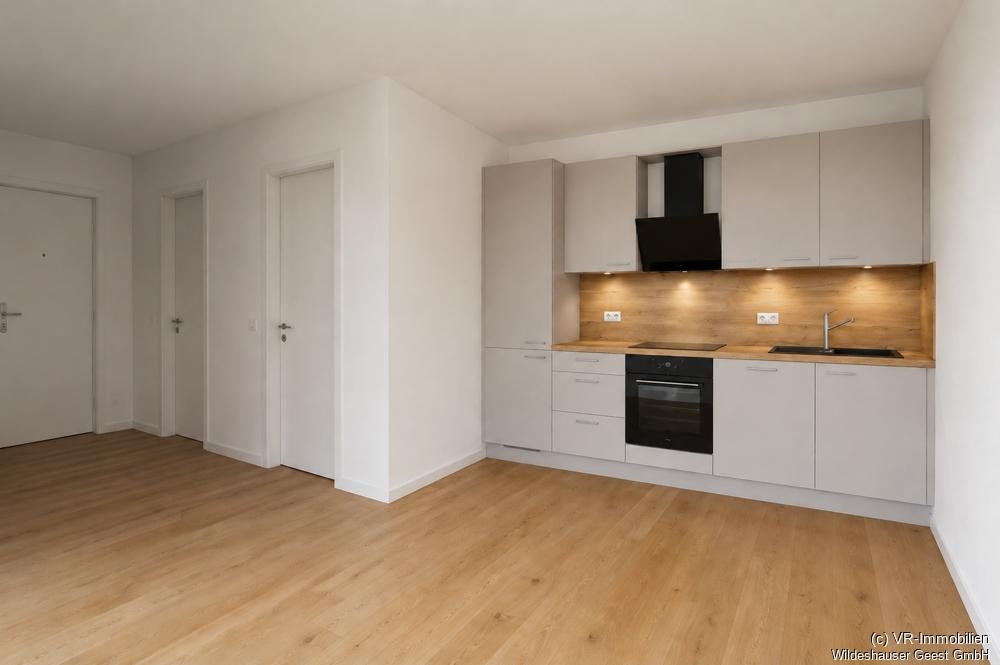 Erstbezug: Energieeffiziente 1-Zimmer-Wohnung in zentraler Lage von Wildeshausen - Photo 1