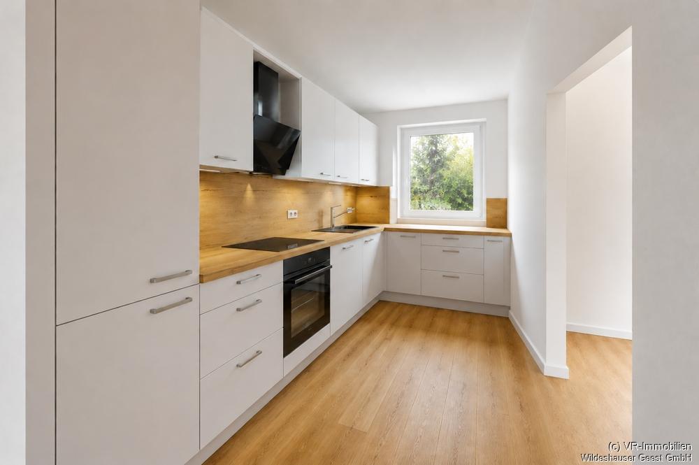 Erstbezug: Energieeffiziente 3-Zimmer-Wohnung in zentraler Lage von Wildeshausen - Photo 3