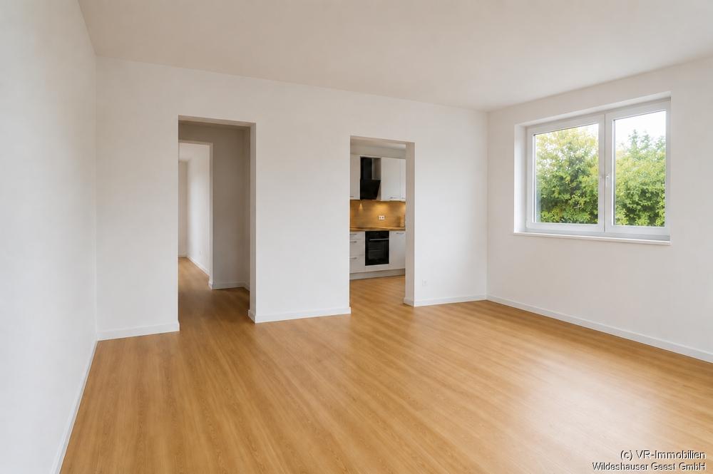 Erstbezug: Energieeffiziente 3-Zimmer-Wohnung in zentraler Lage von Wildeshausen - Photo 1