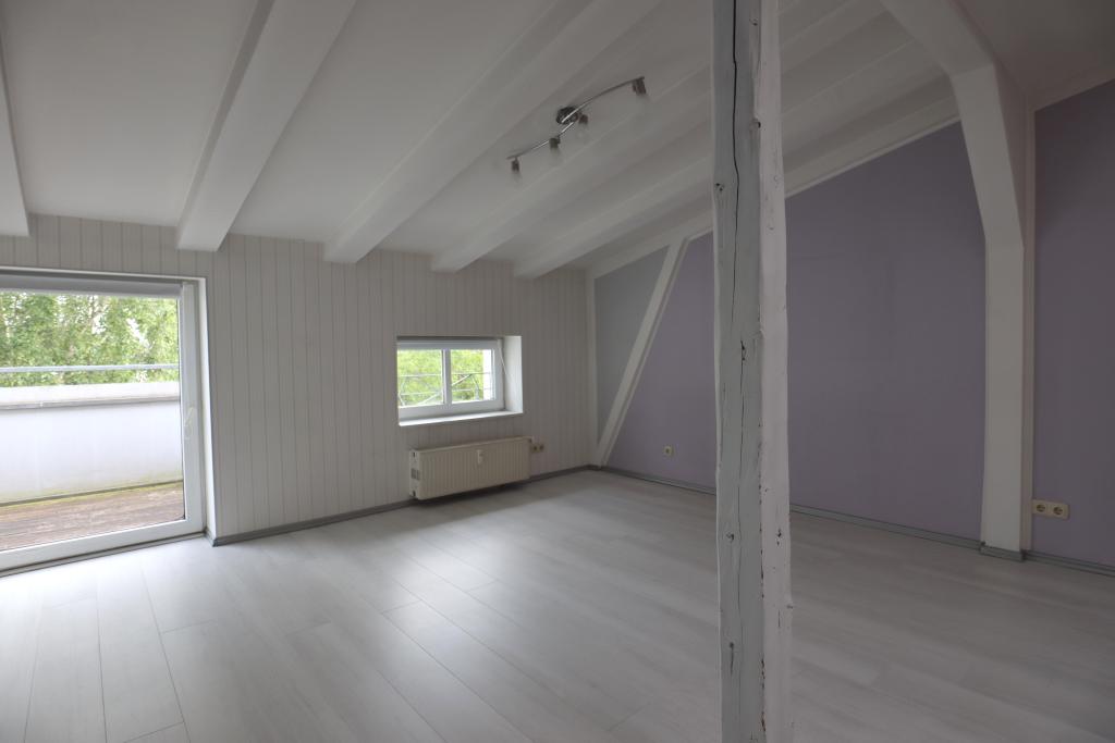 Wohnzimmer mit Balkon