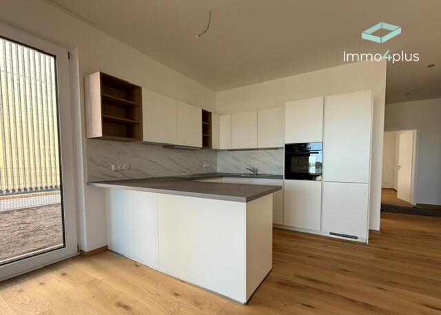 Einmalige Chance - exklusive 4-Zimmer-Wohnung mit Terrasse & Garten in Traumlage am Steinberger See! - Photo 2