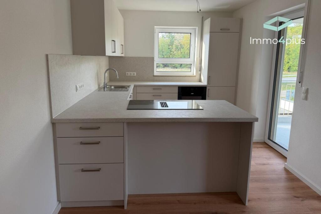 Erstbezug | Hochwertige 3-Zi.-Wohnung mit Tageslichtbad, Einbauküche und Balkon mit Blick ins Grüne! - Foto 2