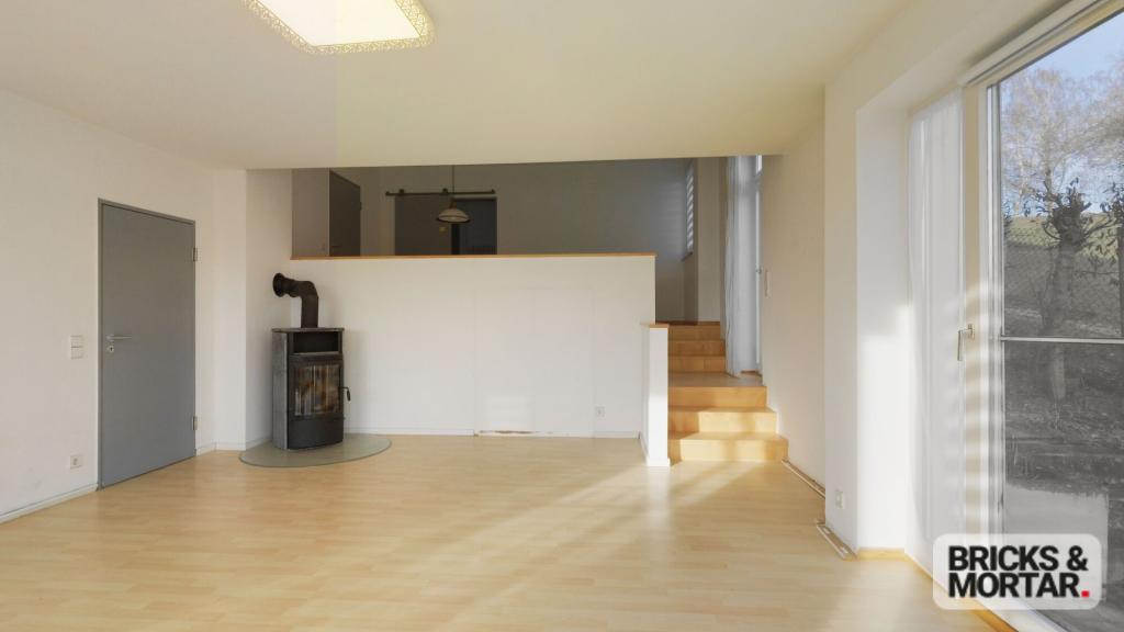 Wohnen auf mehreren Ebenen: Stilvolle Splitlevel-Doppelhaushälfte mit Weitblick - Foto 4