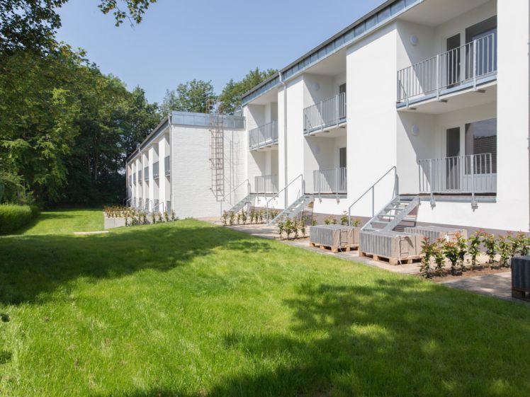 Sanierte 1,5-Zimmer-Wohnung im Erdgeschoss mit Loggia und Terrasse - Foto 1