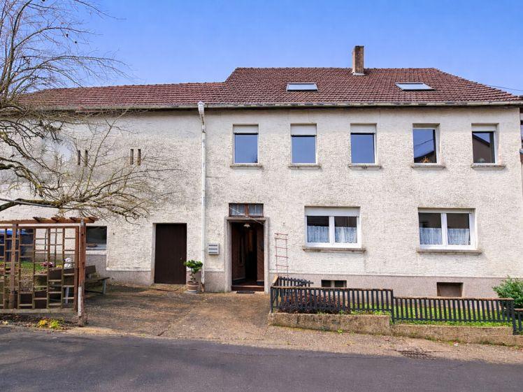 Mehrfamilienhaus mit zusätzlicher Nutzfläche in Merzig-Merchingen zu vermieten - Photo 1