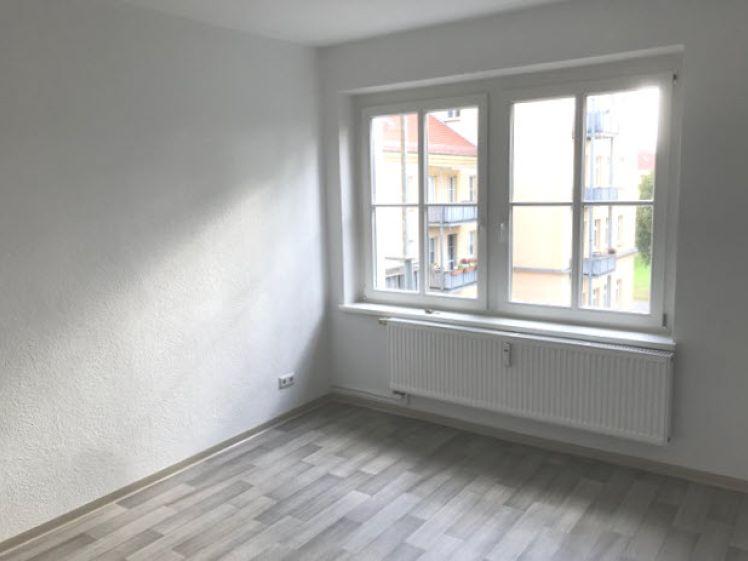 Ankommen, rausgehen, genießen: 2-Raum-EG-Wohnung mit Lieblingsbalkon - Foto 1