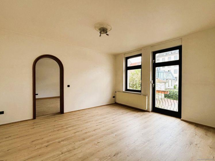 Singlewohnung im ruhigen Hinterhof mit EBK und Balkon - zentrale Lage - Photo 1
