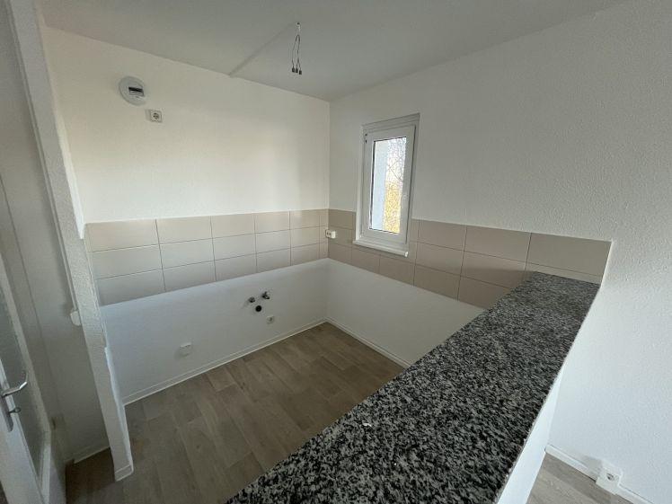 Gemeinsam neu starten – sanierte 3-Raum-Wohnung mit Tresen - Photo 1
