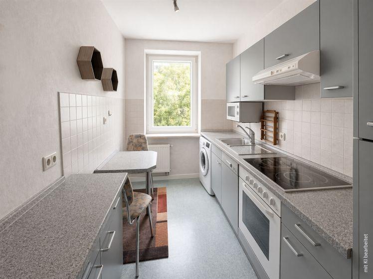 Schöne 2-Raum-Wohnung mit Einbauküche im Grünen - Foto 1