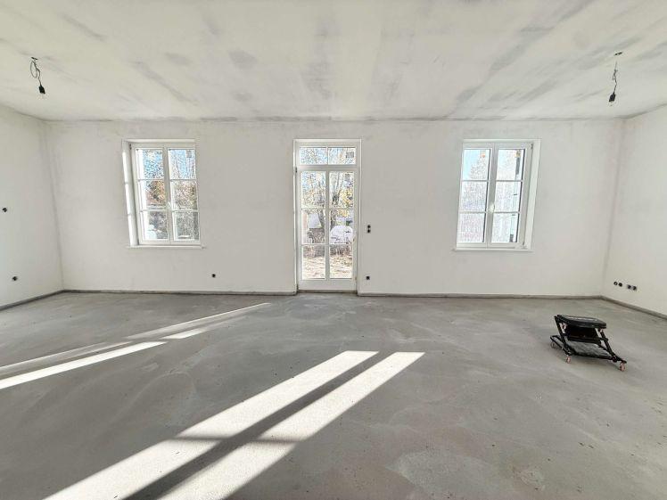 Erstbezug im Neubau – Hochparterre-Wohnung im Zweifamilienhaus mit Terrasse & großem Gartenanteil - Foto 1