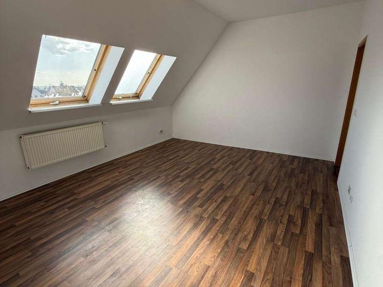 Extravagante Dachgeschosswohnung - Foto 1