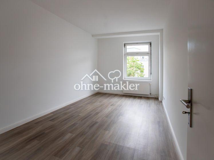 Helle sanierte 2-Zimmer-Altbauwohnung mit Einbauküche im Reiherstiegviertel - Photo 1