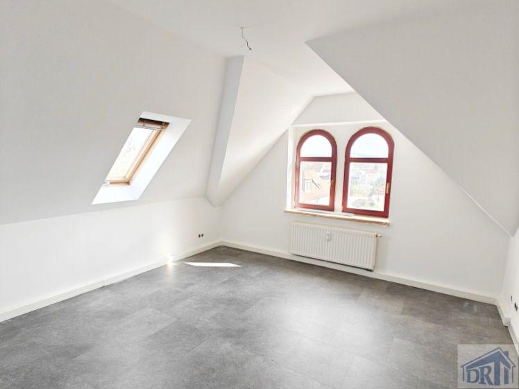große Dachgeschoßwohnung im attraktiven Wohngebiet - Foto 1