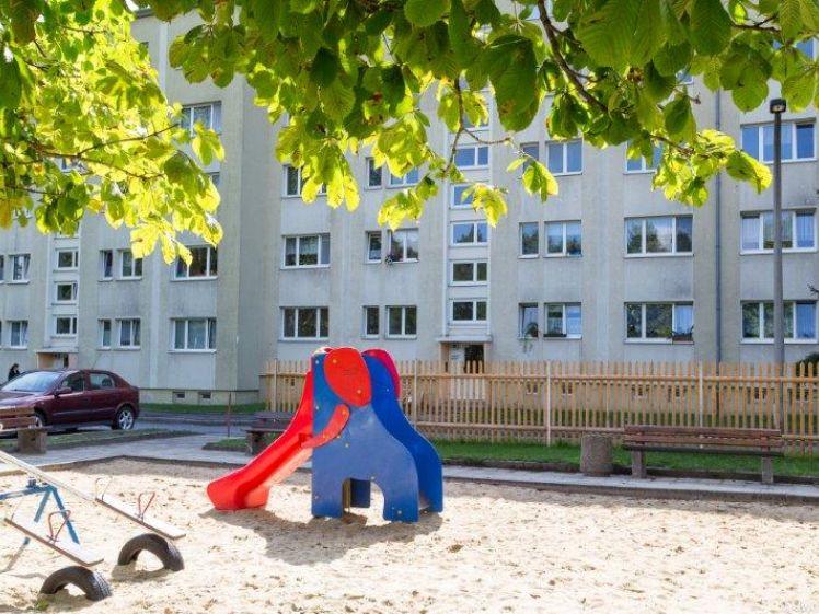 Familienfreundliche Wohnung mit Spielplatz vorm Haus - Foto 1