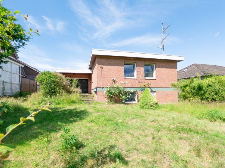 Familienfreundliches Split-Level-Haus mit Kamin, Souterrain und großem Garten am Naturschutzgebiet - Photo 1