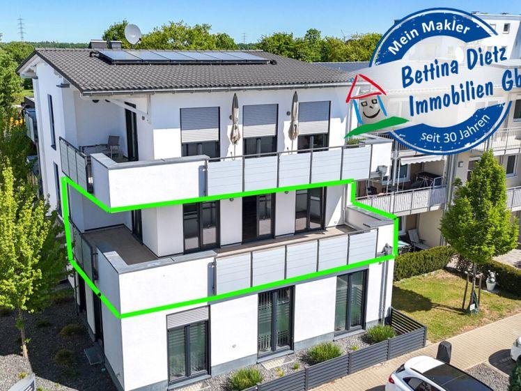 Neuwertige 3 Zi-Wohnung im 1. OG mit Personenaufzug, Kellerraum und 2 PKW - Stellplätzen in Messel! - Photo 1