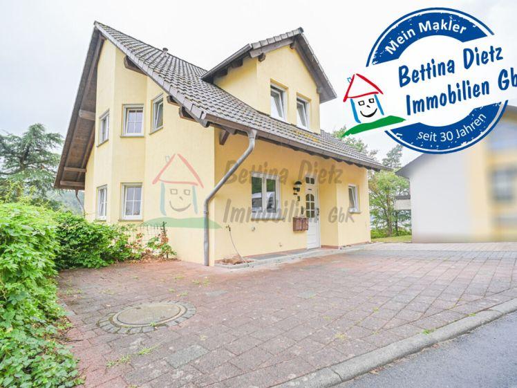 DIETZ: Gepflegte 4-Zimmer Maisonettewohnung mit 2 PKW Stellplätzen in Elsenfeld - Rück - Photo 1