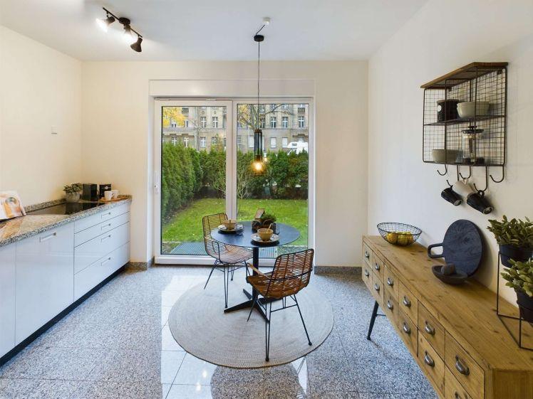 Gartenwohnung mit großzügiger Sonnenterrasse und privatem Gartenparadies - Photo 1