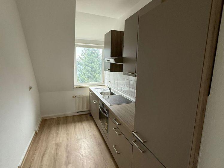 DG Maisonette 3-Zimmer mit EBK, Laminat und Wannenbad in guter Lage - Photo 1