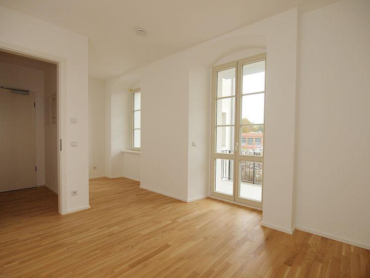 Barrierefreier Wohnungszugang! Schöne 2-Zimmerwohnung in der Alten Baumwolle! EBK + Balkon + Blick zum Markt + Fußbodenheizung + offene Küche + Lift - Photo 1
