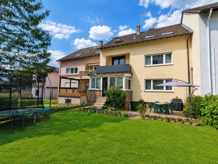 Erdgeschosswohnung mit Wintergarten und Garten - Photo 1