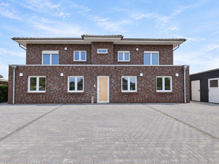 Neubau Erdgeschosswohnung - Erstbezug - NUR MIT Wohnberechtigungsbeschein! - linke Seite - Foto 1