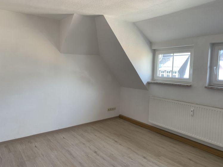 Gemütliche 2-Zimmer-Dachgeschosswohnung in ruhigem Mehrfamilienhauson - Photo 1