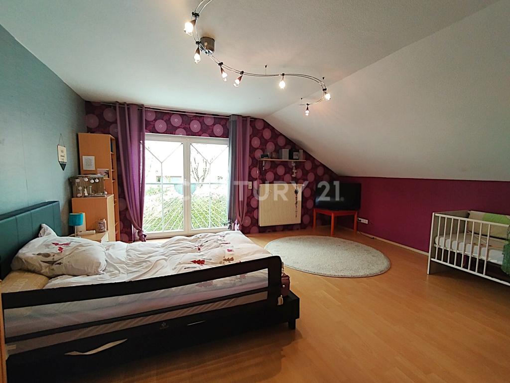 Das zweite Schlafzimmer im Obergeschoss in Richtung Flur