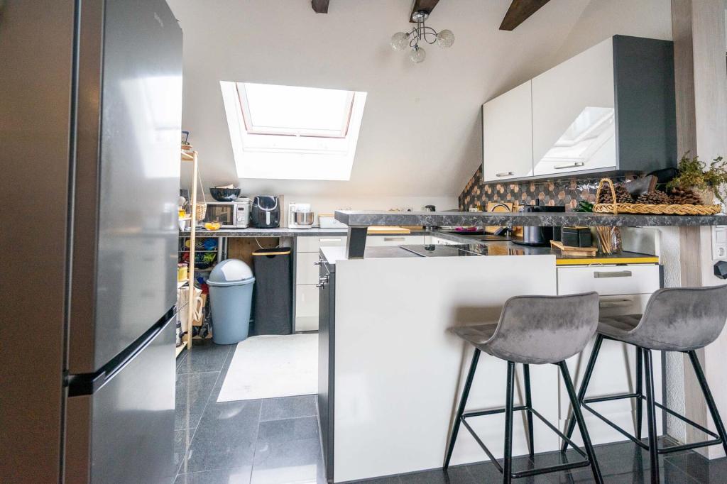 Helle Dachgeschosswohnung mit schönem Sichtgebälk - Foto 5