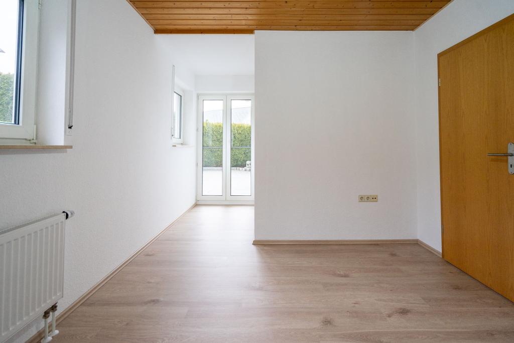 Gemütliche 2-Zimmer Erdgeschosswohnung mit Terrasse und Garten - Foto 1