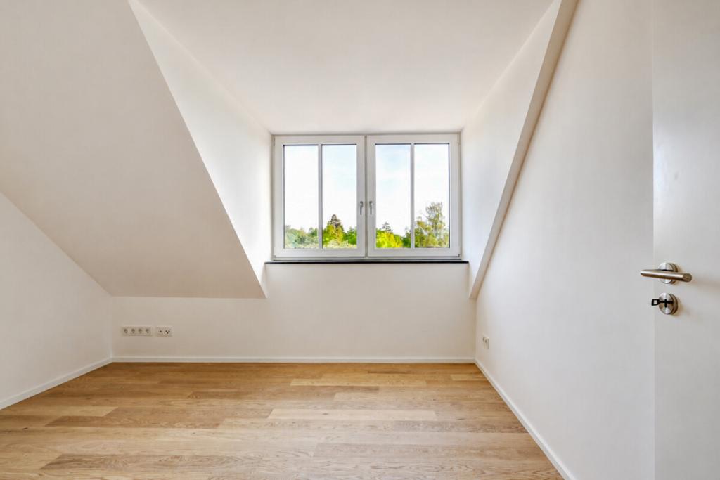 Großzügige 4-Zimmer-Dachgeschosswohnung in bester Gautinger Lage - Photo 4