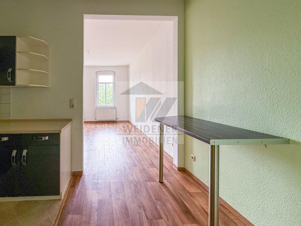Tolle 2-Raum-Wohnung mit Balkon, Einbauküche & Dusche im Ostviertel von Gera! - Photo 5