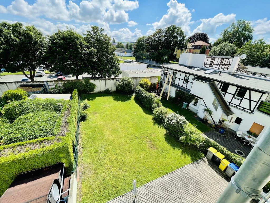 Untermhaus! Schicke 2 Zimmer Wohnung mit Balkon und großem Mietergarten! - Photo 4