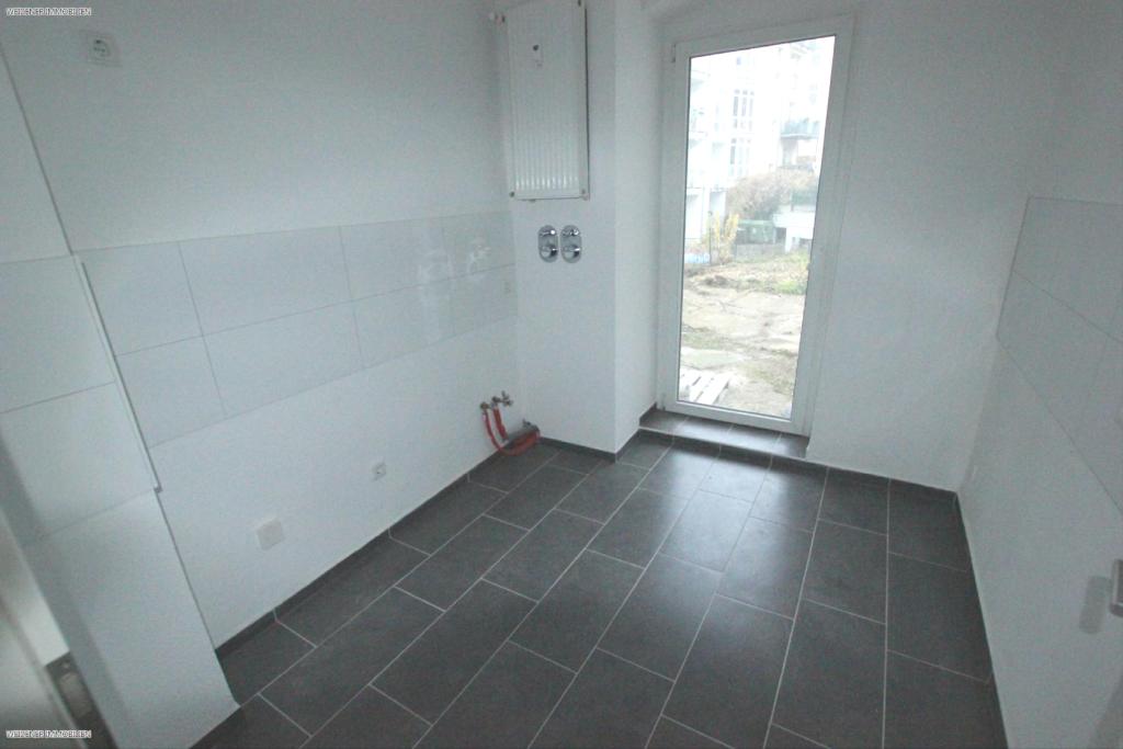 moderne 1 Raum-Wohnung mit 15 m² großer Terrasse und Mietergarten! - Photo 4