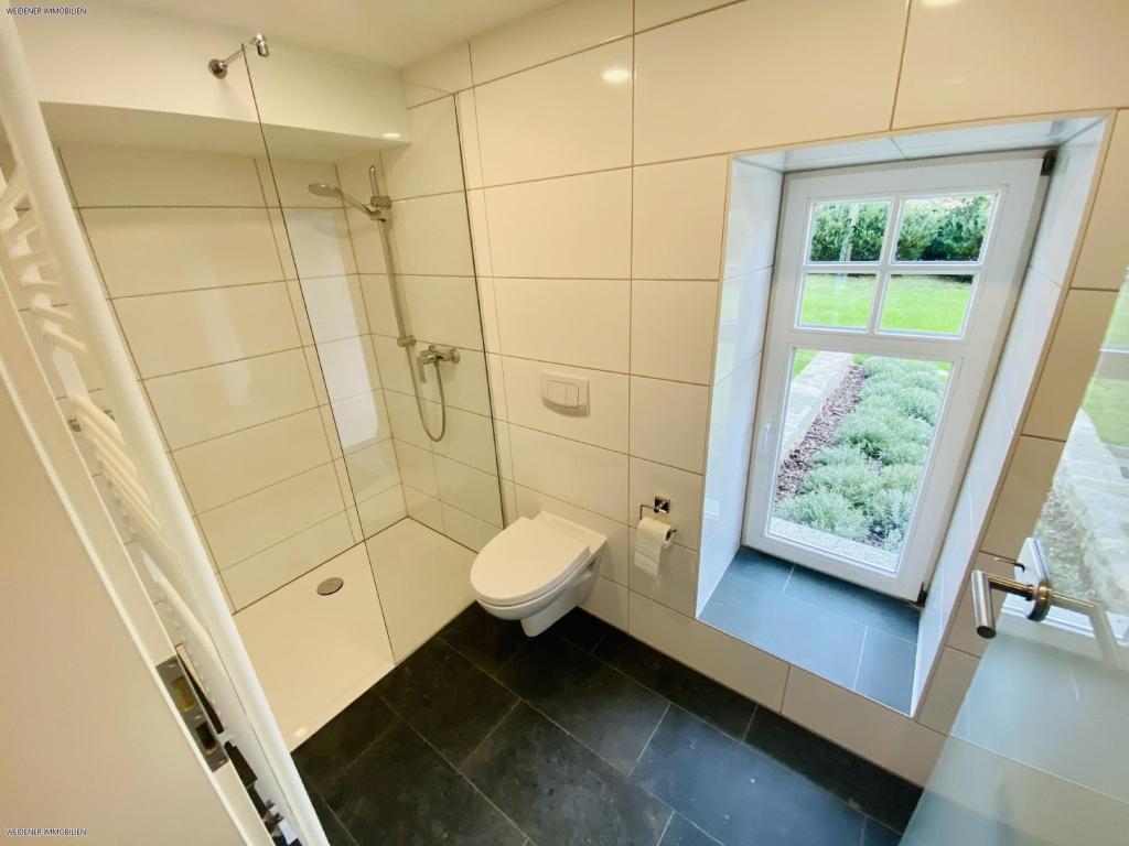 Tolle Terrassenwohnung über 3 Etagen im modernisierten, historischen 3 Seiten Bauernhof! - Foto 2