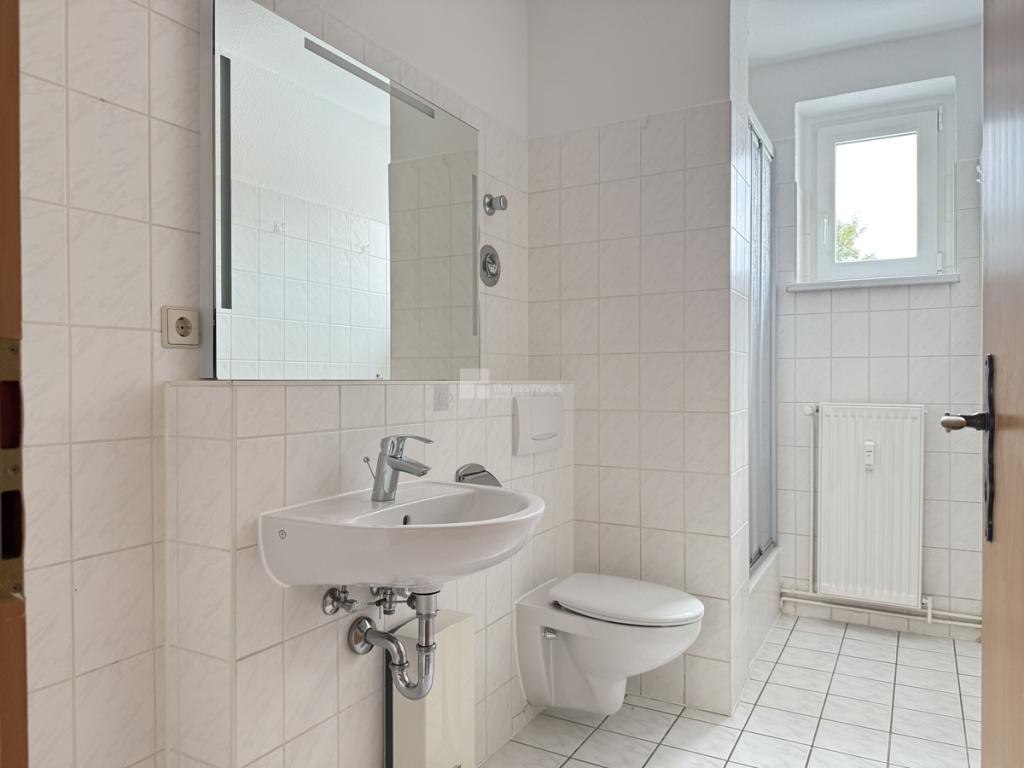 Das Duschbad mit Waschmaschinenstellplatz