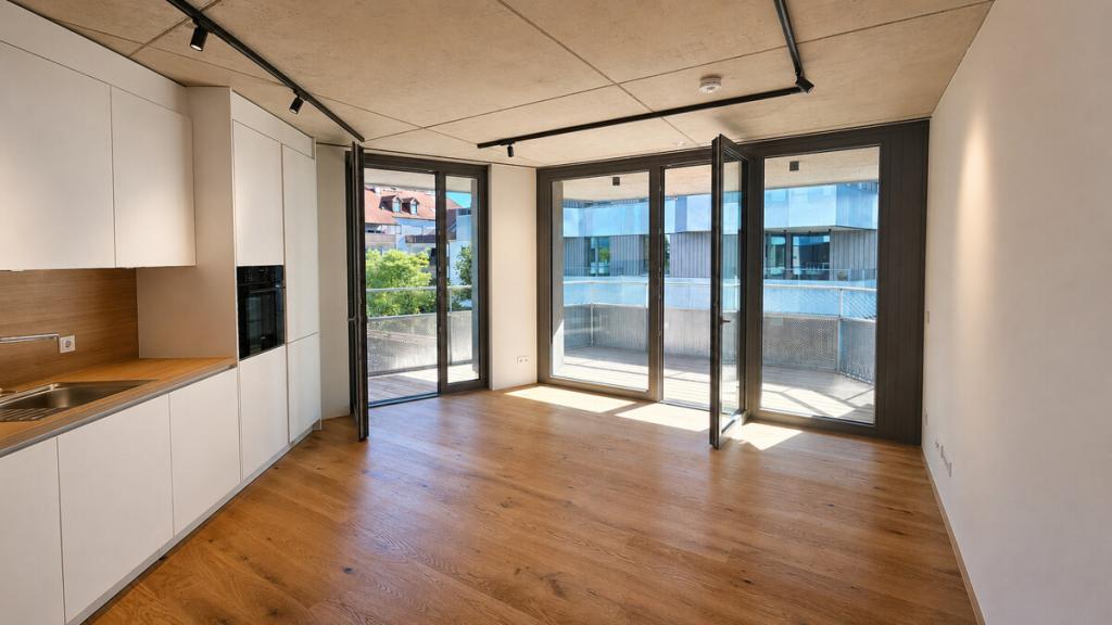 Designstarke Wohnung mit großem Balkon und maßgefertigter Einbauküche - Photo 1