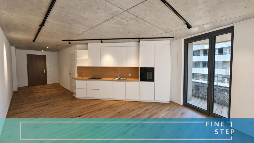 Designstarke Wohnung mit großem Balkon und maßgefertigter Einbauküche - Photo 2