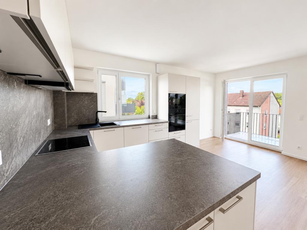 Attraktives Wohlfühlen in energieeffizientem Neubau als Erstbezug mit EBK, ablösefrei! - Foto 2