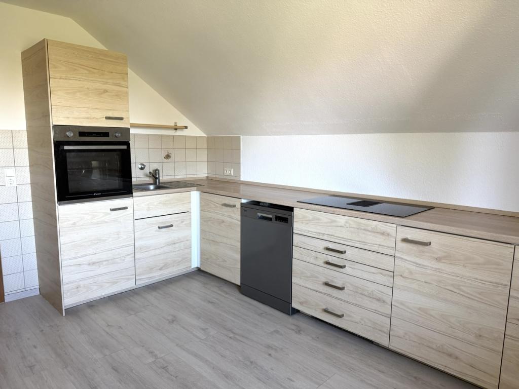 Ruhige 2-Zimmer-Dachgeschosswohnung mit Balkon und Garage in Dorschhausen - Foto 1